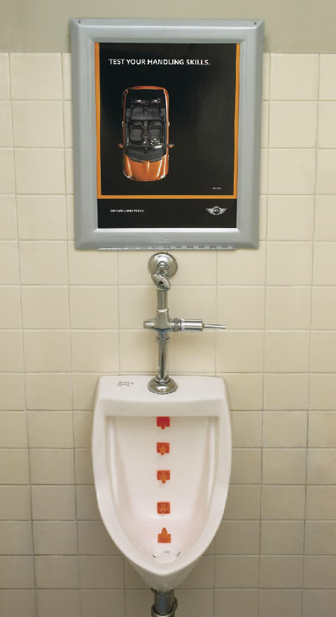 Testing your handling skills - Urinal Advertising Testing your handling skills - Urinal Advertising